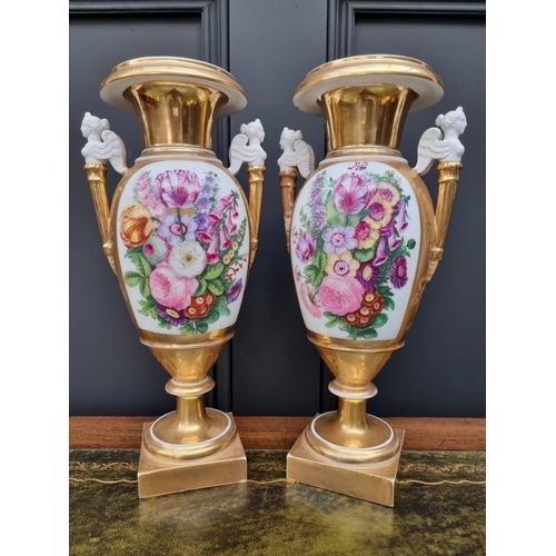 1453 - A pair of 19th century Continental porcelain twin handled vases, 29.5cm high, (s.d. to one).... 