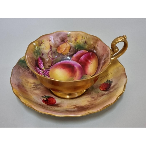 1604 - A Royal Worcester fruit painted cabinet cup and saucer, circa 1926, the cup painted by H G Mose... 