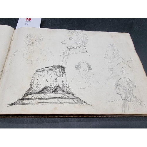 19 - GEORGIAN SCRAP ALBUM: early 19thc scrap album containing a broad range of pencil sketches, prin... 