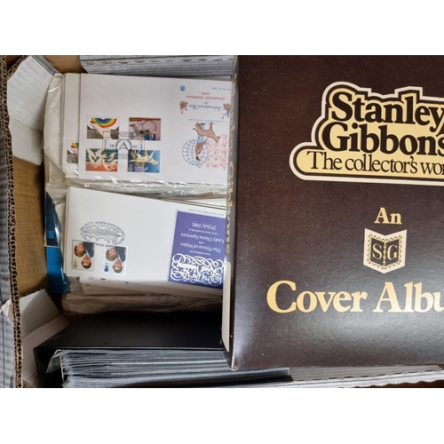 194 - FIRST DAY COVERS: a large collection in 4 modern albums and bundle: together with a small colle... 