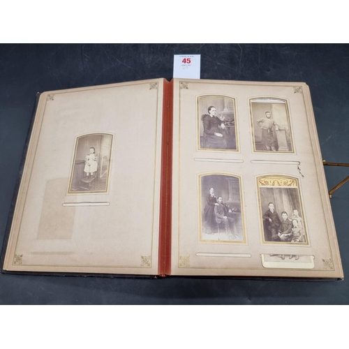 45 - CARTE DE VISITE ALBUM: Chichester & Brighton: album of approx 74 carte de visite and cabine... 