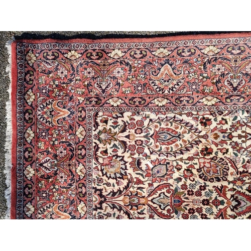 1000 -  A Persian carpet, having allover floral decoration to central field, with floral borders,... 