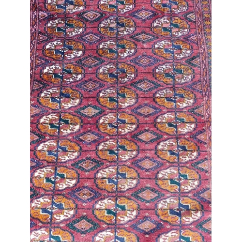 1004 - A Bokhara rug, having repeated decoration allover, 174 x 132cm. 