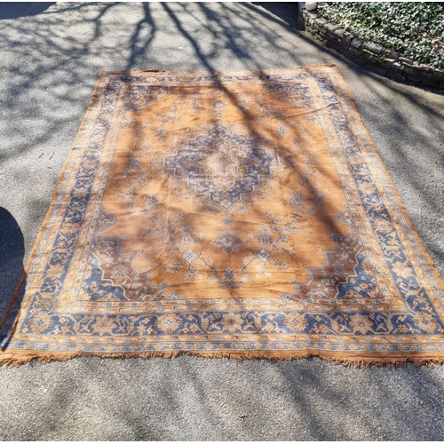 1016 - A large Isfahan carpet, having central floral medallion, with floral decoration to central field, wi... 