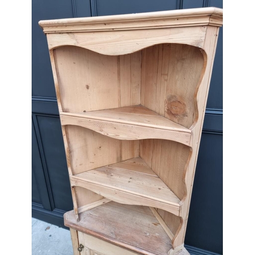 1018 - An antique pine standing corner cupboard, 170.5cm high x 64cm wide. 