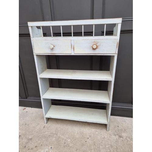 1021 - An old blue painted open bookcase, 130cm high x 87cm wide. 