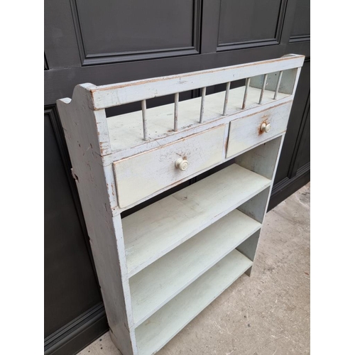 1021 - An old blue painted open bookcase, 130cm high x 87cm wide. 