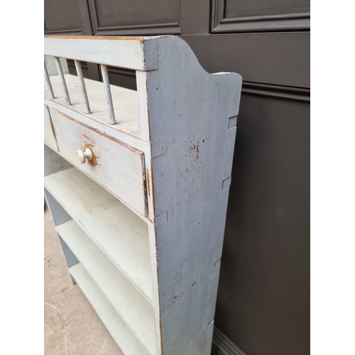 1021 - An old blue painted open bookcase, 130cm high x 87cm wide. 