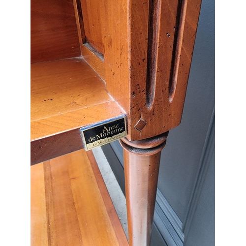 1022 - A reproduction cherry wood console table, labelled 'Anne de Morienne', 89cm wide. ... 