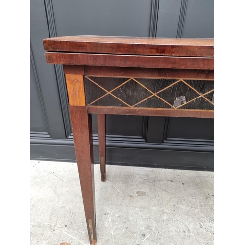 1029 - A late 18th century Italian mahogany and inlaid card table, 85.5cm wide, (a.f.). ... 