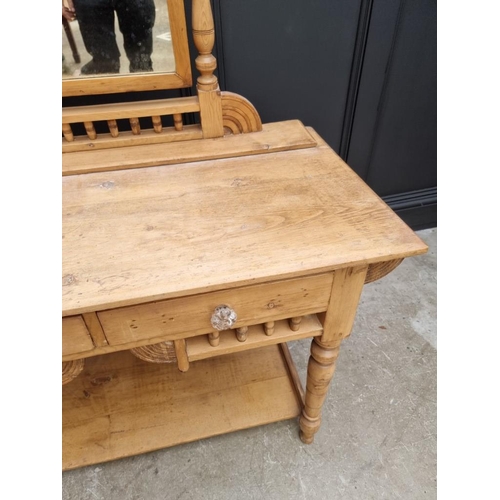 1030 - An antique pine mirror back dressing table, 107.5cm wide. 