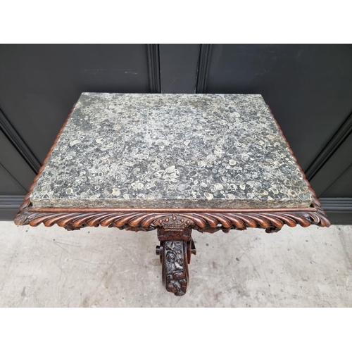 1036 - An interesting 19th century carved oak console table, with green marble top above a gadrooned frieze... 