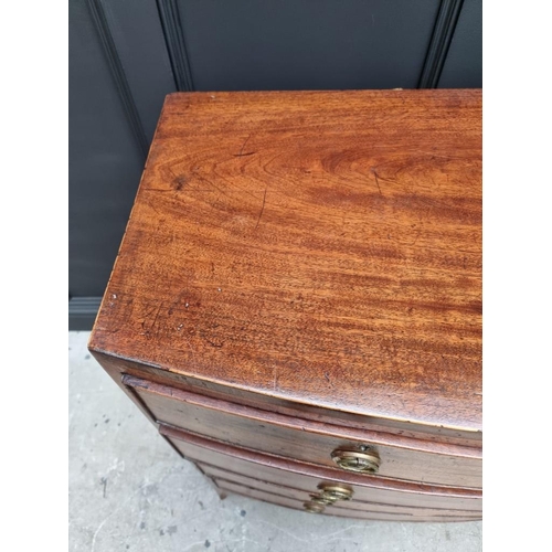 1043 - A George III mahogany and line inlaid bowfront chest of drawers, 105cm wide. 