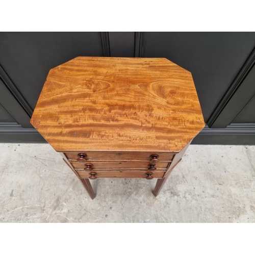 1045 - An early 19th century mahogany octagonal work table, with hinged top and frieze drawer, 49cm wide.&n... 