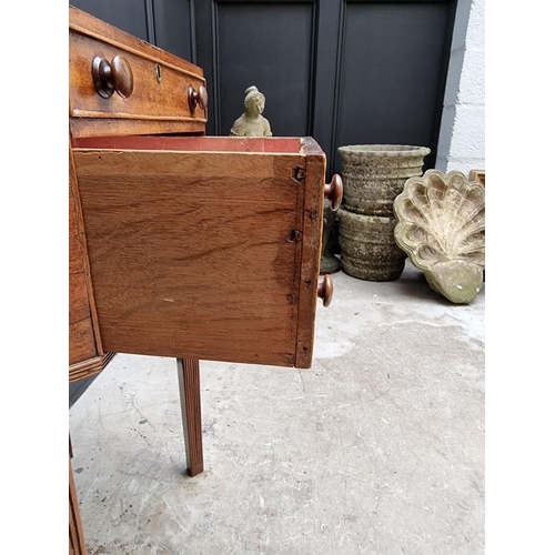 1045 - An early 19th century mahogany octagonal work table, with hinged top and frieze drawer, 49cm wide.&n... 