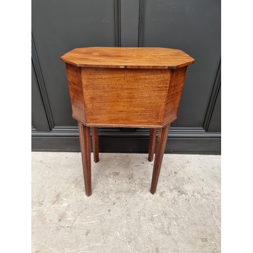 1045 - An early 19th century mahogany octagonal work table, with hinged top and frieze drawer, 49cm wide.&n... 