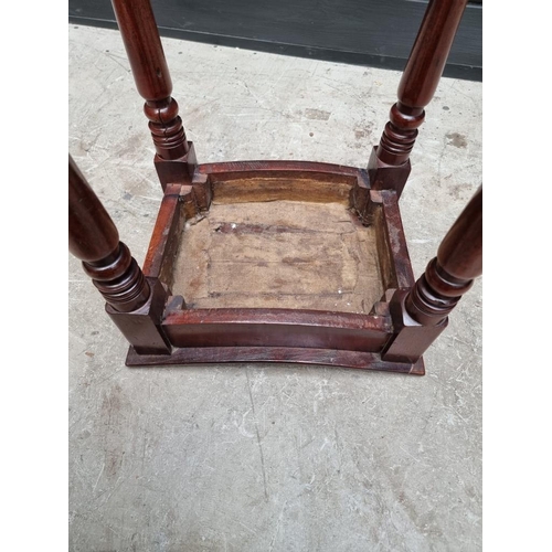 1046 - A George IV mahogany stool, with shaped top, 36.5cm wide. 