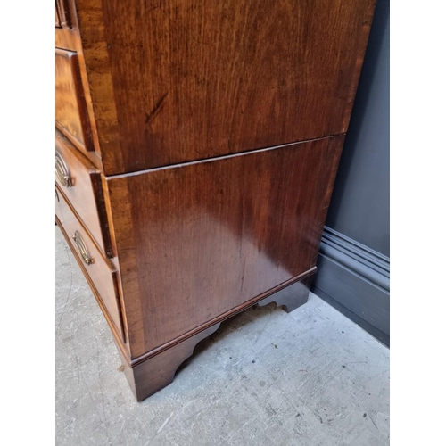 1051 - A George III mahogany and crossbanded bureau, 92.5cm wide. 