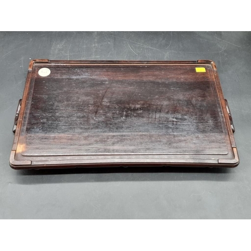 1054 - A Chinese carved hardwood twin handled rectangular tray, with simulated bamboo decoration, 57cm wide... 