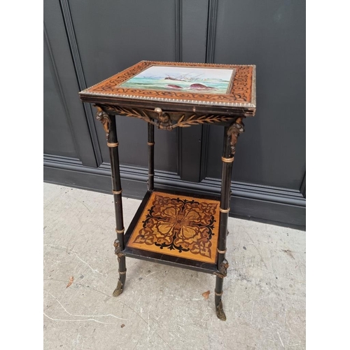 1056 - An unusual late 19th century Egyptian revival ebonized and inlaid occasional table, the top inset wi... 