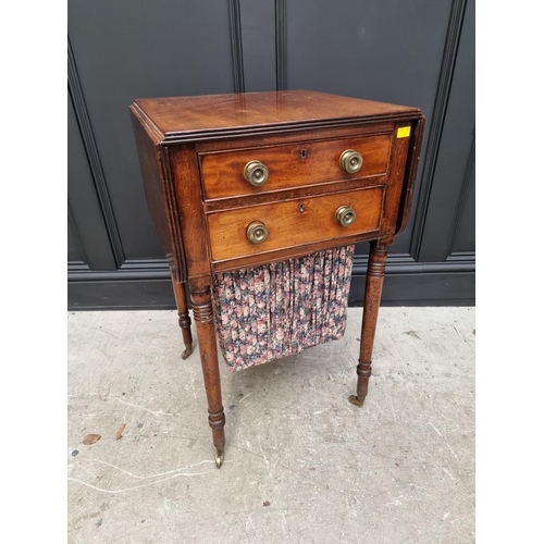 1057 - An early 19th century mahogany Pembroke work table, 47cm wide. 