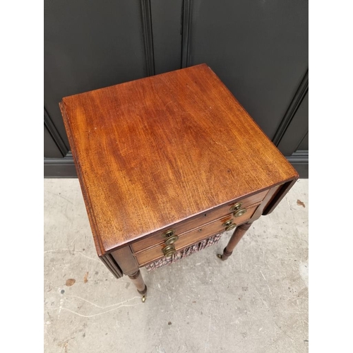 1057 - An early 19th century mahogany Pembroke work table, 47cm wide. 