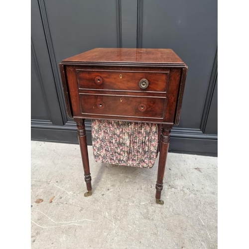 1057 - An early 19th century mahogany Pembroke work table, 47cm wide. 