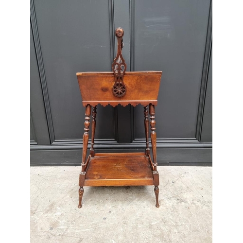 1061 - An antique mahogany work box on stand, 43cm wide at base. 