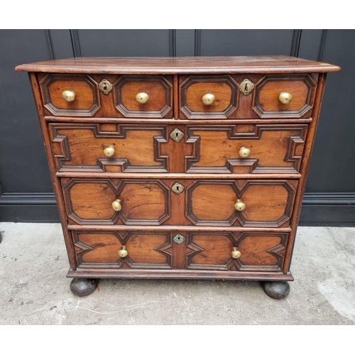 1063 - A rare late 17th century solid walnut geometrically moulded chest of drawers, on bun feet, 98.5cm wi... 