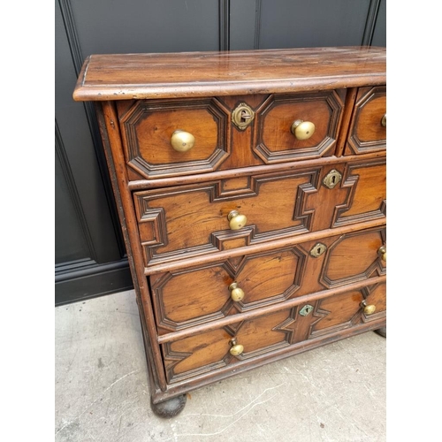 1063 - A rare late 17th century solid walnut geometrically moulded chest of drawers, on bun feet, 98.5cm wi... 