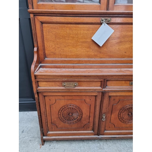 1064 - An unusual late 19th century mahogany bureau bookcase, 120cm wide. 