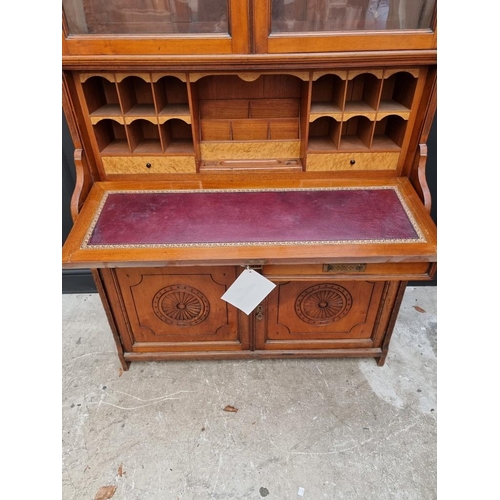 1064 - An unusual late 19th century mahogany bureau bookcase, 120cm wide. 