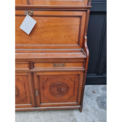 1064 - An unusual late 19th century mahogany bureau bookcase, 120cm wide. 