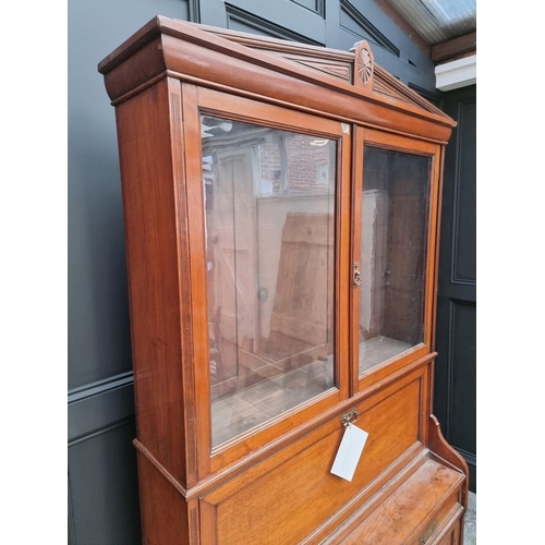 1064 - An unusual late 19th century mahogany bureau bookcase, 120cm wide. 