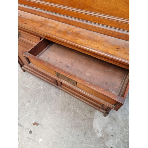 1064 - An unusual late 19th century mahogany bureau bookcase, 120cm wide. 