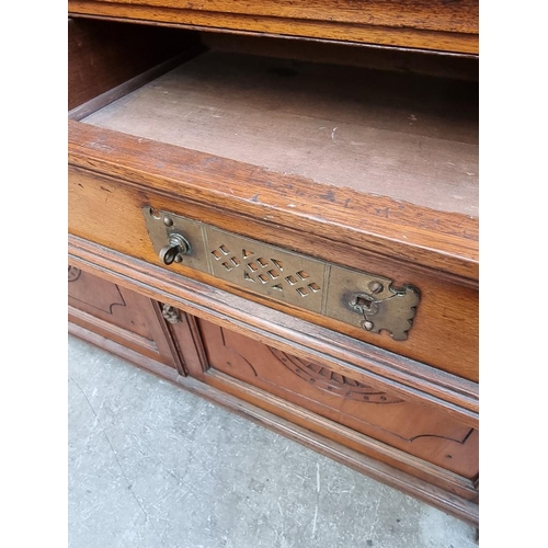 1064 - An unusual late 19th century mahogany bureau bookcase, 120cm wide. 