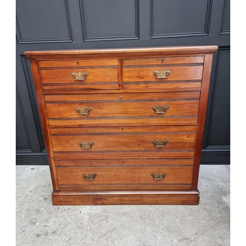 1069 - A late Victorian walnut chest of drawers, stamped 'Jas Shoolbred & Co' and numbered 989, 122cm w... 