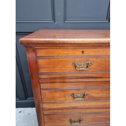 1069 - A late Victorian walnut chest of drawers, stamped 'Jas Shoolbred & Co' and numbered 989, 122cm w... 