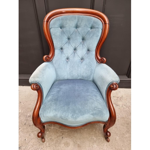 1082 - A Victorian mahogany and button upholstered occasional armchair. 