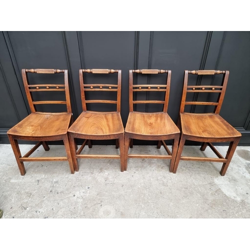 1084 - A set of four early 19th century ash and elm Mendlesham chairs. 