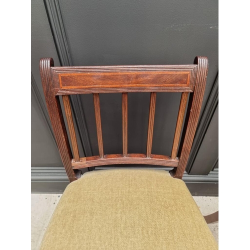 1086 - Two 19th century mahogany dining chairs, one with cane seat, (one s.d.).