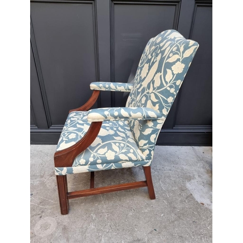 1088 - A reproduction mahogany Gainsborough chair. 