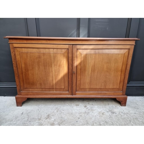 1090 - A mahogany shallow bookcase, 132.5cm wide. 