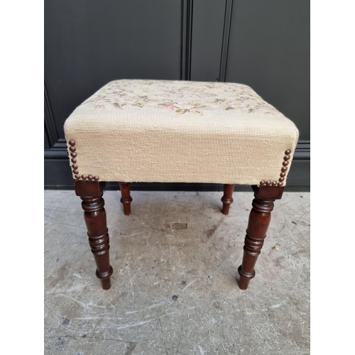 1092 - A Regency mahogany and upholstered stool. 