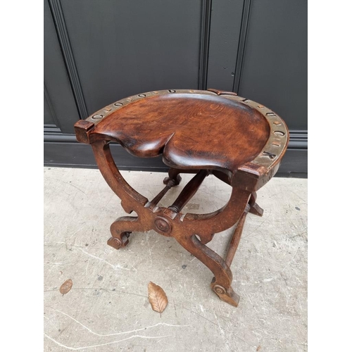 1093 - An unusual late Victorian mahogany novelty horseshoe stool, inscribed 'Good Luck'. ... 