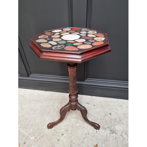 1095 - A carved walnut and specimen marble octagonal tripod table, 38cm wide. 