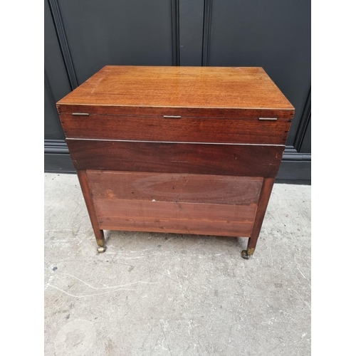 1099 - A small antique mahogany two drawer chest, with hinged top, 61cm wide, (alterations).... 