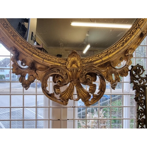 1105 - A large and impressive 19th century gilt frame oval wall mirror, 154 x 90cm. ... 