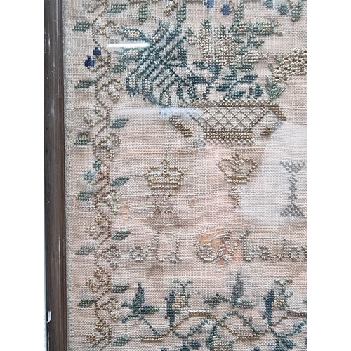 1146 - A 19th century needlework sampler, by 'Mary Teresa Delany', 32.5 x 24.5cm.  ... 