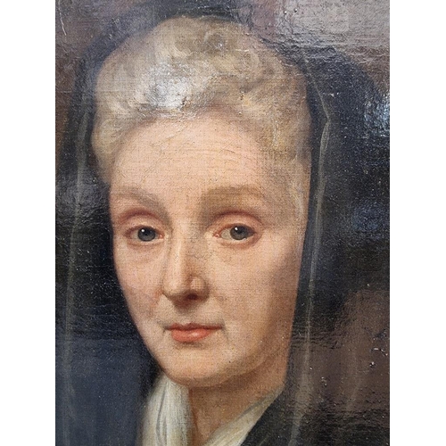 1188 - European School, 19th century, head and shoulders portrait of a lady, oil on canvas, 35 x 29cm, in a... 